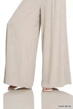 Sand beige lounge pants with a smocked waistband and wide legs in textured woven fabric from Zenana