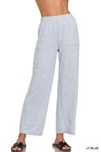 Light blue melange hacci lounge pants with elastic waistband and wide-leg design for comfortable wear