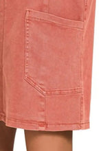 Coral-colored denim skirt with classic patch pocket and visible stitching in soft coral pink zenana washed adjustable style