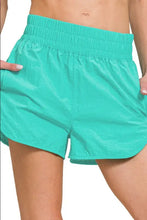 Zenana Windbreaker smocked waistband teal running shorts with pockets