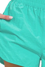 Zenana windbreaker smocked waistband running shorts in teal