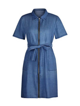 A mid-length denim dress with short sleeve design, collar, and front zipper closure in classic blue denim