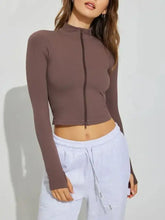 Brown zip-up long sleeve active outerwear crop top with high neckline