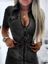 Black denim dress with short sleeves features a front zipper and belt tie detail in a sleeve denim dress design