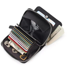 Zippered leather card case with black textured wallet, silver zipper, cards, coins, cash
