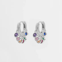 Sterling silver huggie earrings with dangling colorful zircon gemstones